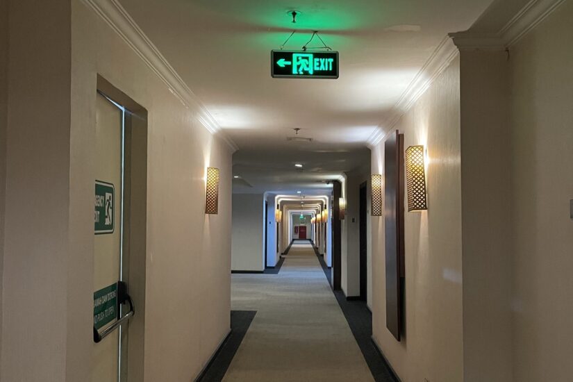 Hotel Corridor with Fire Safety Doors and Emergency Lighting