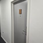 Grey Fire Door with number 8 on it