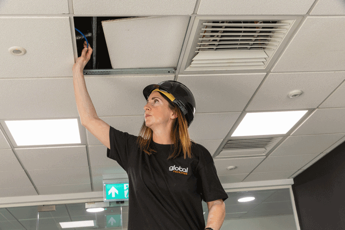 Woman checking Fire compartmentation